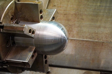 CNC lathe machine forming cutting the metal shaft parts.CNC turning machine