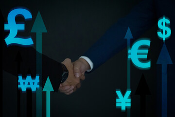Closeup business people shaking hands overlay on currency symbol and growth arrow background. Business finance technology and investment concept