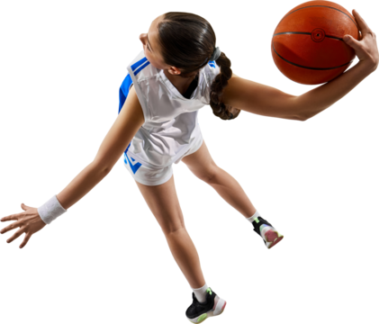 Focused female basketball player in white-blue uniform dribbles ball while sprinting forward from dynamic low-angle back view. Concept of youth empowerment