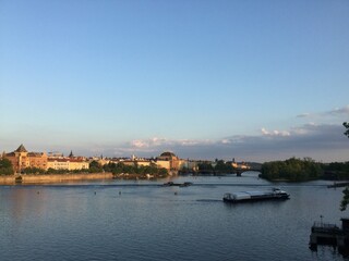 view of the city of prague at sunset