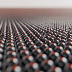 Rows of shiny black spheres with red accents are arranged in a repeating geometric pattern, creating a visually striking, modern, and abstract surface.