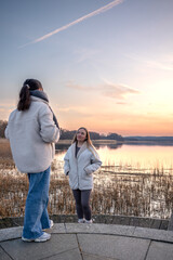 Walk along the promenade. A walk by the sea. Walking in nature. Sunset.