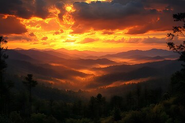 Fototapeta premium Mountain Sunrise with Dramatic Orange Sky and Misty Valleys in Scenic Landscape Photography