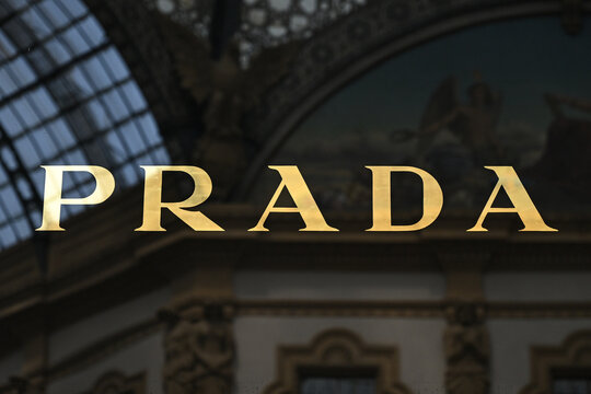 Milan, Italy - June 17, 2025: The Prada logo is seen on the boutique windows in Galleria Vittorio Emanuele II gallery ahead of Milan Fashion week taking place from June 20th to 24th, 2025