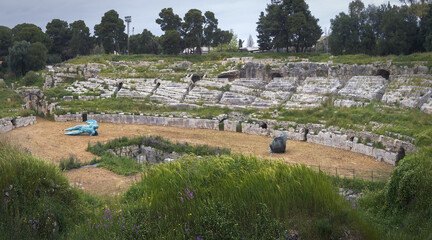 Exploring Siracusa's Ancient Roman Amphitheater on a Quiet Day, Sicily, Italy
