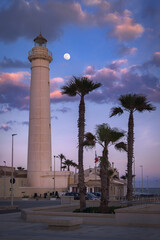 Moonlit Skies Over Punta Secca Lighthouse Bring Peaceful Sicily Night, Italy