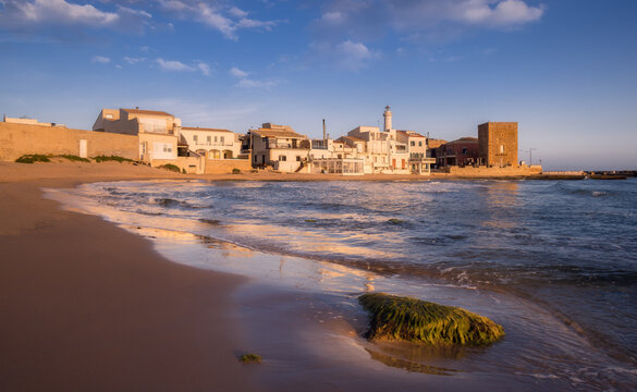 Golden Sands and Tranquil Waters at Punta Secca in Ragusa, Sicily, Italy