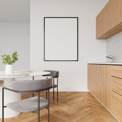 Minimalist Scandinavian kitchen dining interior with blank vertical poster frame on white wall