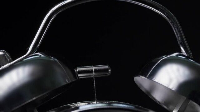 close-up of classic metal alarm clock bells