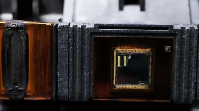 close-up of high-tech inkjet printer heads in