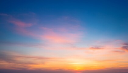 Fototapeta premium beautiful of blurry colorful sunrise sky with cloud in a holiday for background or wallpaper twilight scene pastel sky in the morning