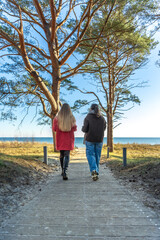 Walk along the promenade. A walk by the sea. Walking in nature.