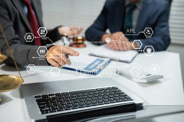 Teamwork of business lawyer meeting working hard about legal legislation in courtroom to help their...