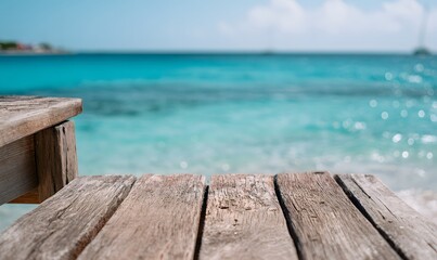 Fototapeta premium Wooden dock extending into turquoise ocean waters, sunny beach scene with soft focus background,Generative AI
