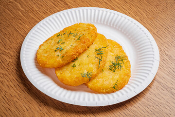 Deliciously crispy potato pancakes seasoned with fresh herbs, perfect for any meal or snack