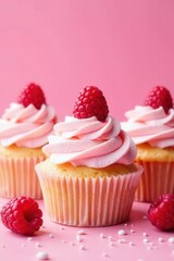 Delicate pastel cupcakes; vibrant raspberry swirl & sprinkles Pink backdrop , overhead, baking, colorful