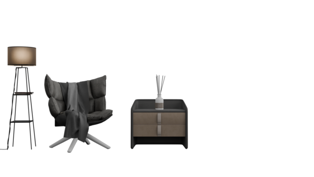 a chair  lamp  and table with a blanket on it