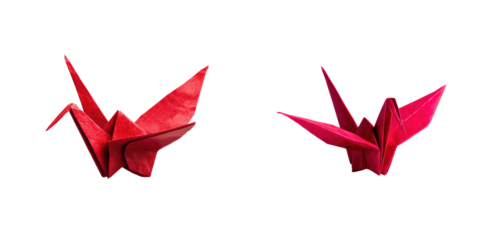 Two red origami cranes crafted from folded paper, showcasing intricate creases and sharp edges in a delicate and artistic design.
