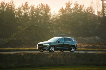 Fototapeta premium luxurious automobile on open rural road