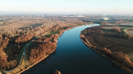 Obraz premium Idyllic aerial view of river and rural forest area
