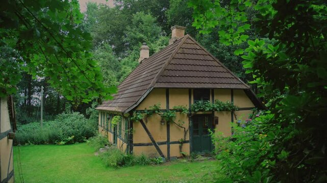 Charming cottage surrounded by greenery in Langeland, Denmark, amidst nature