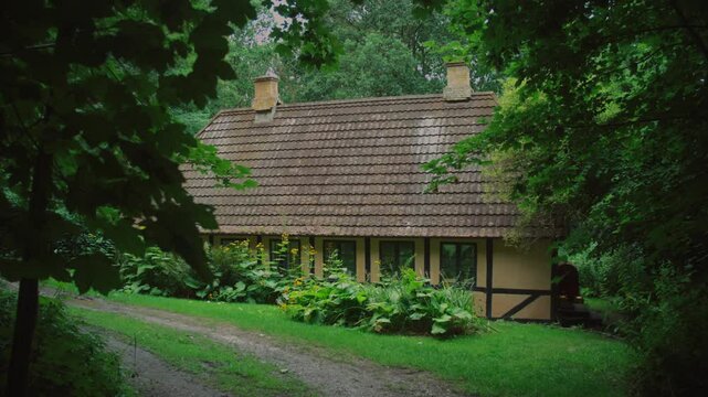 Beautiful house surrounded by lush greenery, located in Langeland, Denmark