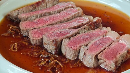 Grilled Picanha steak, medium rare.