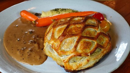 Beef Wellington. A beef tenderloin steak wrapped in puff pastry.
