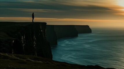 Solitary person standing on cliff edge at sunset, silhouetted against open sky, symbolizing inner struggle and despair. Emotional concept of isolation and personal challenges.