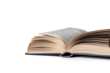 Fototapeta premium Close-up view of a slightly leaning pile of aged books with weathered pages and embossed covers, detailed shadows