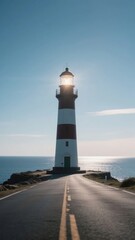 Lighthouse by the Sea with a Road Leading Up to It