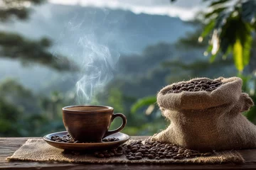 Küchenrückwand glas motiv Kaffee und Kaffeebohnen A cup of coffee is sitting on a table next to a bag of coffee beans. The steam from the coffee is rising into the air, creating a cozy and inviting atmosphere. Concept of warmth and comfort  © lashkhidzetim