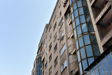Typical facade of concrete panel building. Post Soviet flat of blocks