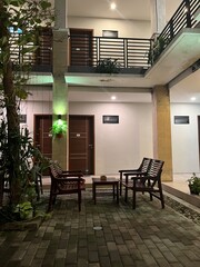 wooden chairs and tables in an inn
