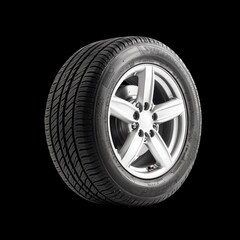 Obraz premium High-Quality Car Tire with Sleek Alloy Rim on Black Background