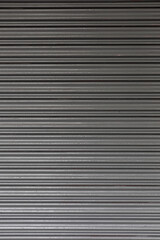 Obraz premium Industrial Metal Roller Shutter Door Texture Background