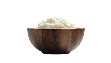 Creamy, smooth, dairy product in a wooden bowl