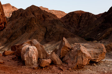 Multi-colored rocks and mountain peaks of the Arava Desert in southern Israel's Eilat Mountains.