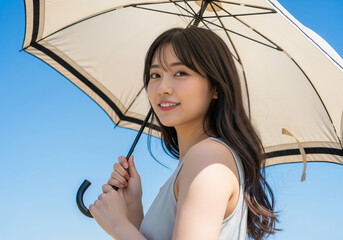 夏に日傘をさしている女性