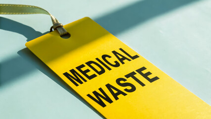 Medical waste tag highlights biohazard concept in healthcare safety and proper disposal