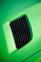 Aerodynamic green exotic supercar carbon part