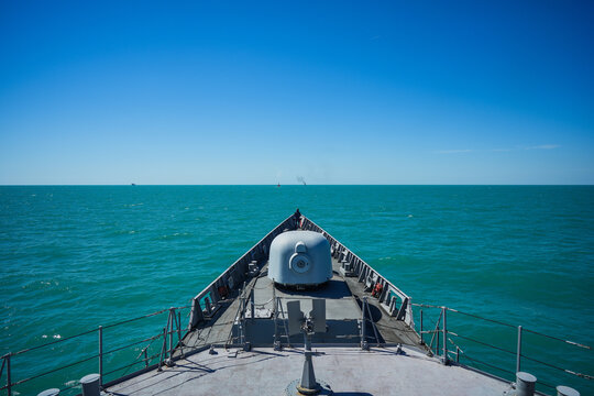 Fototapeta Bow deck of a military ship with artillery