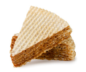 Pieces of waffle cake close-up on a white background. Isolated