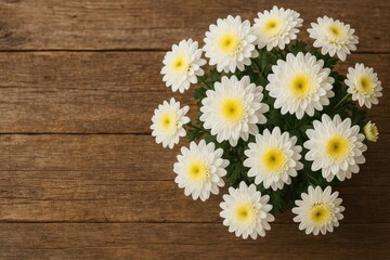 Obraz premium Vintage wooden surface adorned with blooming chrysanthemums