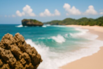 Abstract blurred scene of rocky shoreline with crashing waves at a coastal beach
