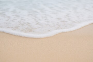 Out-of-focus scenery featuring coastal sands and ocean waves