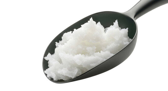 Black spoon with solid white coconut oil isolated on white background