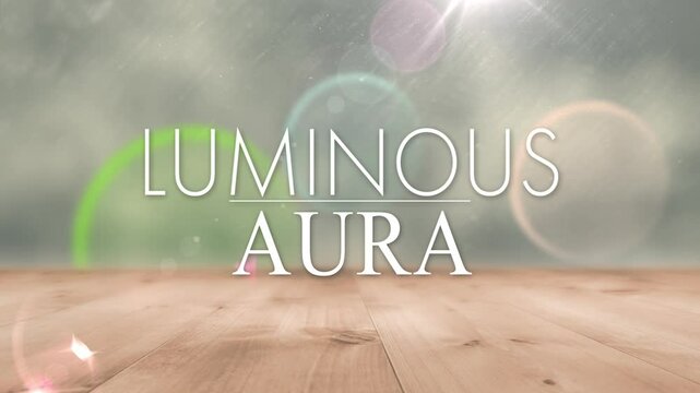 Fading in LUMINOUS AURA aligning on studio floor, with drifting orbs and underline for title reveal