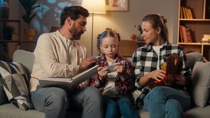 Caucasian family problem at evening home kid child daughter girl dependency addiction of mobile...