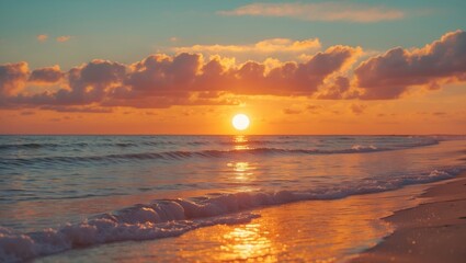 A peaceful beach sunset with a warm, golden glow illuminating the sky and reflecting on the calm waves and wet sand. Gentle clouds drift across the sky, enhancing the tranquility of the scene.